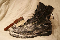 Cleaning boot with saddle soap