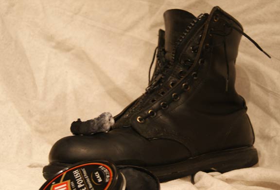 Cleaning boot with saddle soap