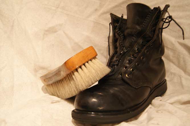 Cleaning boot with saddle soap